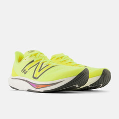 Running | Men New Balance FuelCell Rebel V3 Cosmic Pineapple With Blacktop And Neon Dragonfly